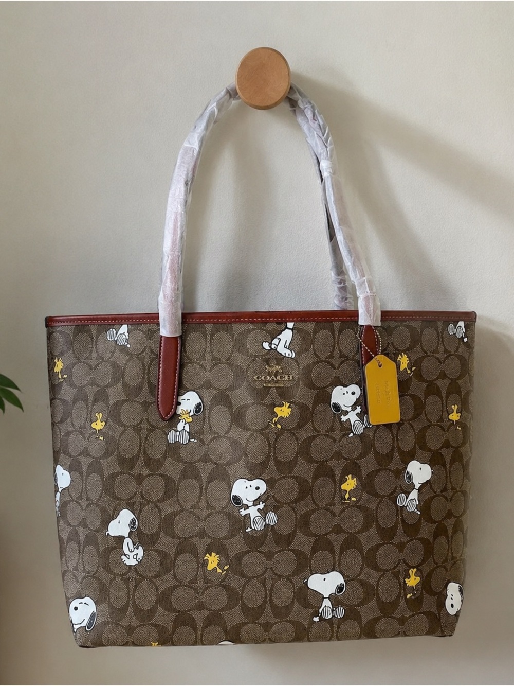 Coach Brown Signature Snoopy & Woodstock Tote with Yellow Tag